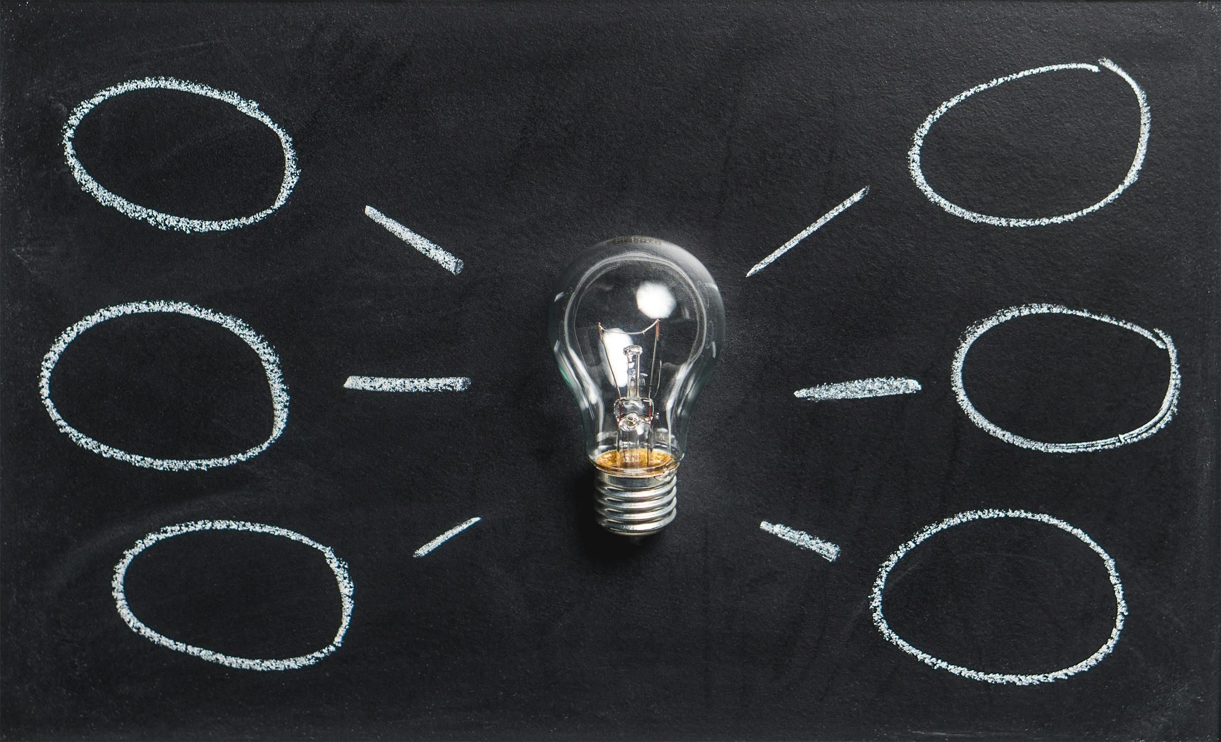 a lightbulb with chalk diagram